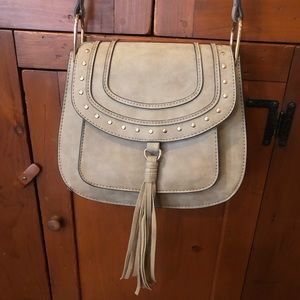 NWOT Cute faux suede shoulder bag with stud and tassel details